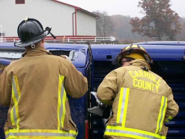 Vehicle collision with one trapped, 11-14-2007