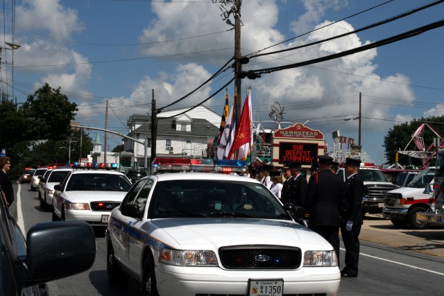 Mourning and honoring Baltimore County Police Lieutenant Michael Howe, 08-16-2008.