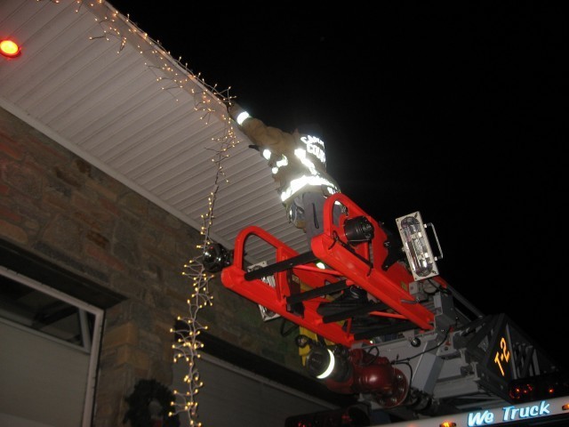 Decorating the Station for Christmas, 2007. Do not try this at home!