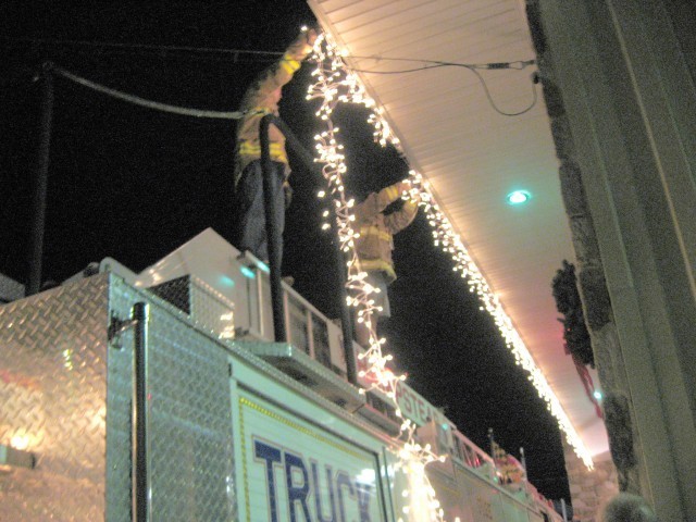 Decorating the Station for Christmas, 2007. Watch that electrical wire!