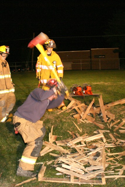 He tries to impress the chief with his chopping skills.