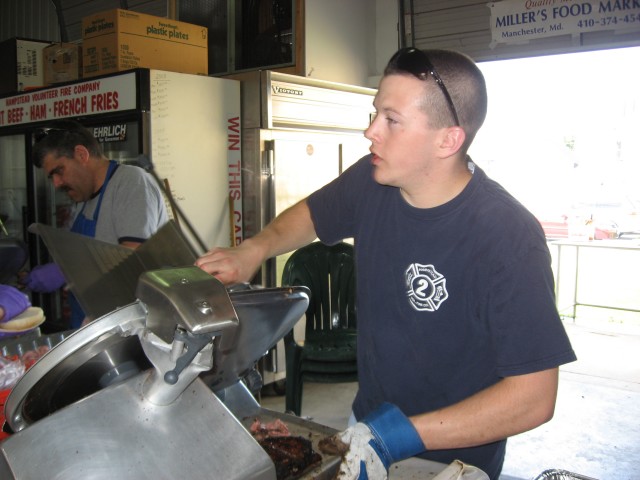 Hampstead Day, 2008.  &quot;Uh-oh, I hope that last customer liked the knuckle sandwich.&quot;