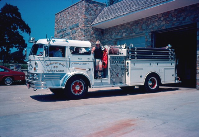 1967 'B' model Mack, Driver; Charles &quot;Doc&quot; Walter, Standing; Asst. Chief Dana Seipp, Seated; Tom Lare - Circa 1975